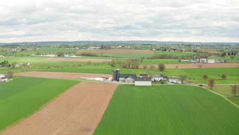 rising aerial of farmland in rural lancaster county pa, usa