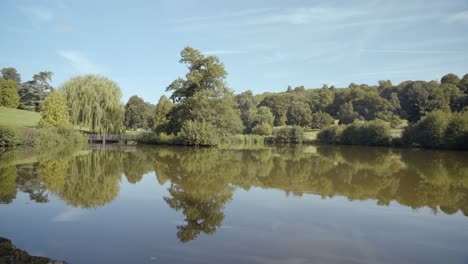 static shot of tranquil pond and trees at chartwell, a country home owned by winston churchill near westerham, kent, england