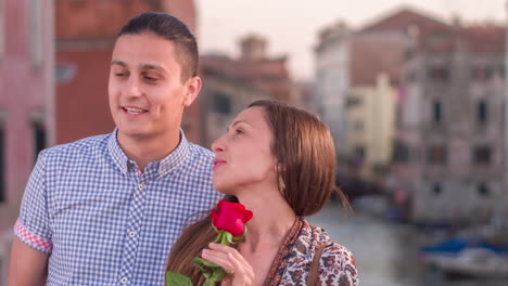 couple in venice with a rose