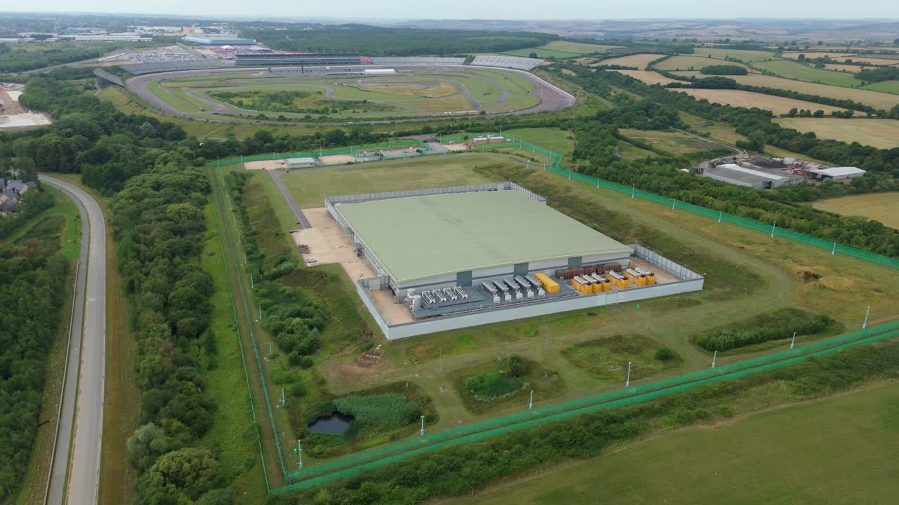 Drone Footage of High-Tech Data Centre in the UK Featuring Modern IT Storage Facilities and Efficient Cooling Systems