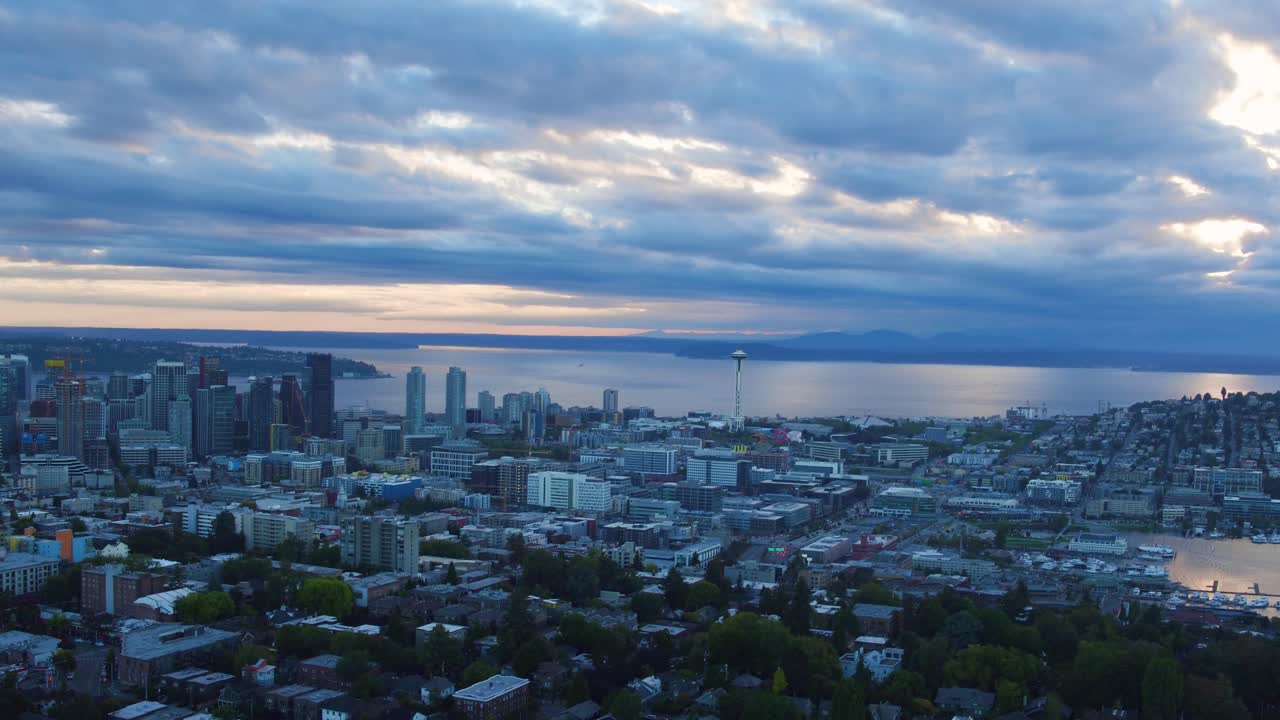 Panning aerial shot of Seattle's dreary skyline circa 2016.