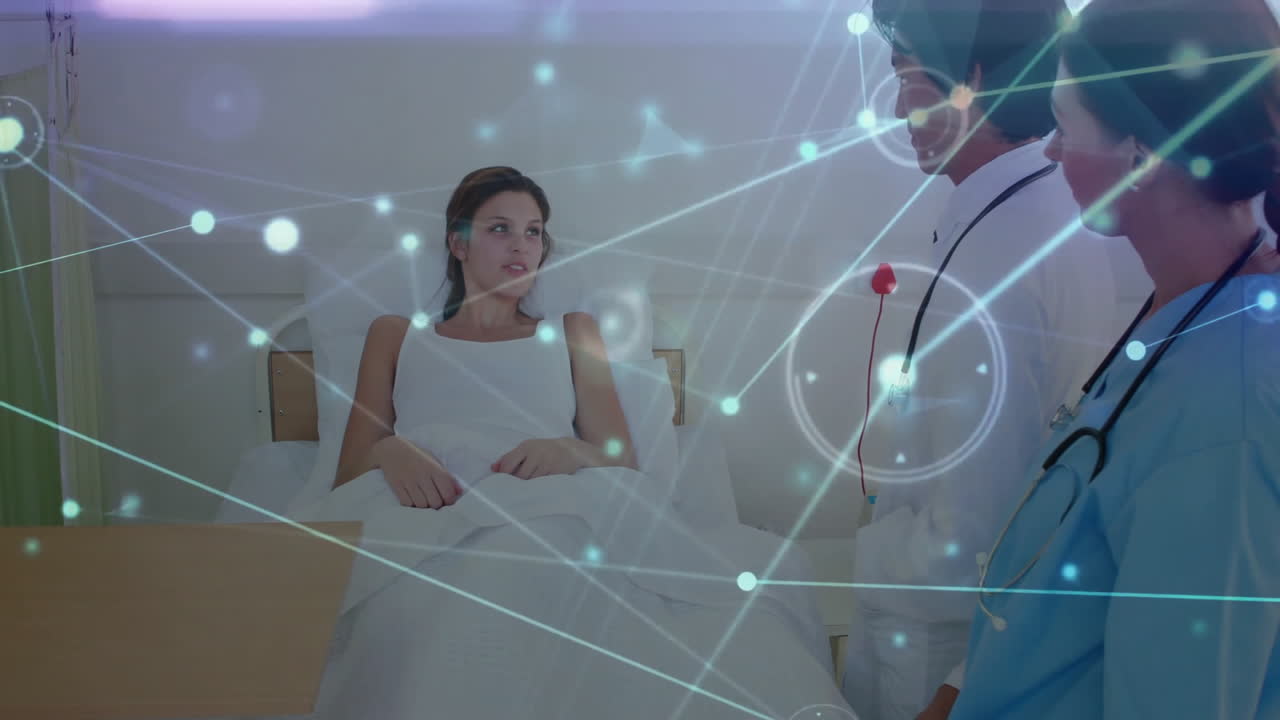 female patient lying in hospital bed with healthcare staff monitoring using digital network overlay