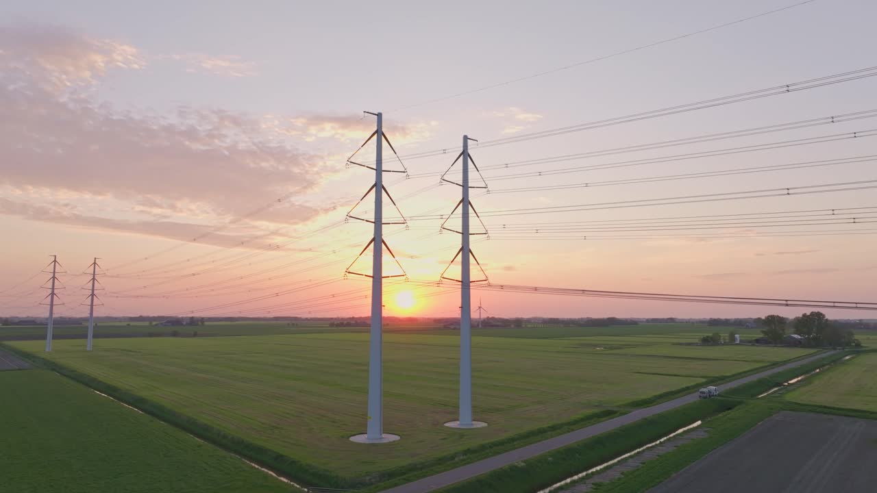 Power supply lines in Westerwijtwerd at dusk,Netherlands