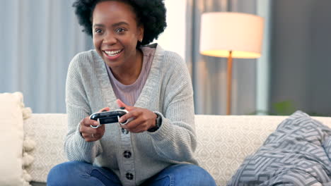 Excited-female-gamer-cheering-after-winning