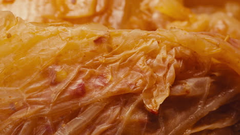 close-up of texture fermented spicy cabbage kimchi with in can. preservation of vegetables in glass jars. fermentation preserved kimchi cabbage with spices macro. asian cuisine.