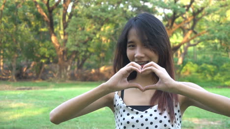 Slow-motion-portrait-of-joyful-Asian-woman.