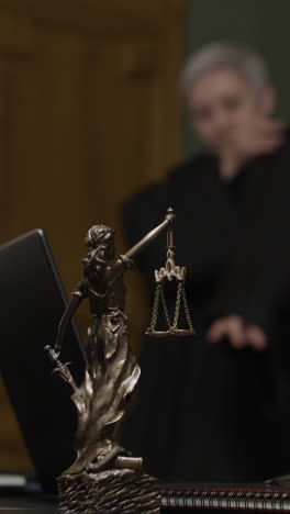 lady justice statue in courtroom