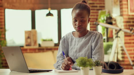 woman writing down important ideas