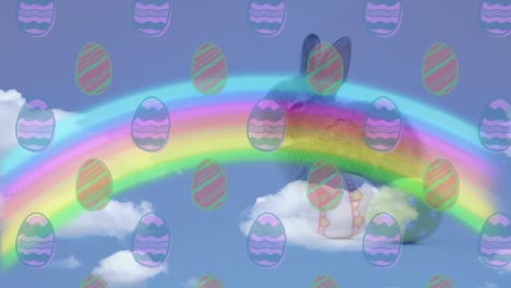 Animation-Von-Regenbogen-Und-Eiern,-Die-über-Den-Hasen-Fallen