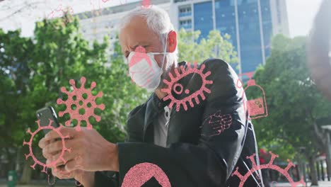 animation of covid 19 icons over senior man wearing face mask