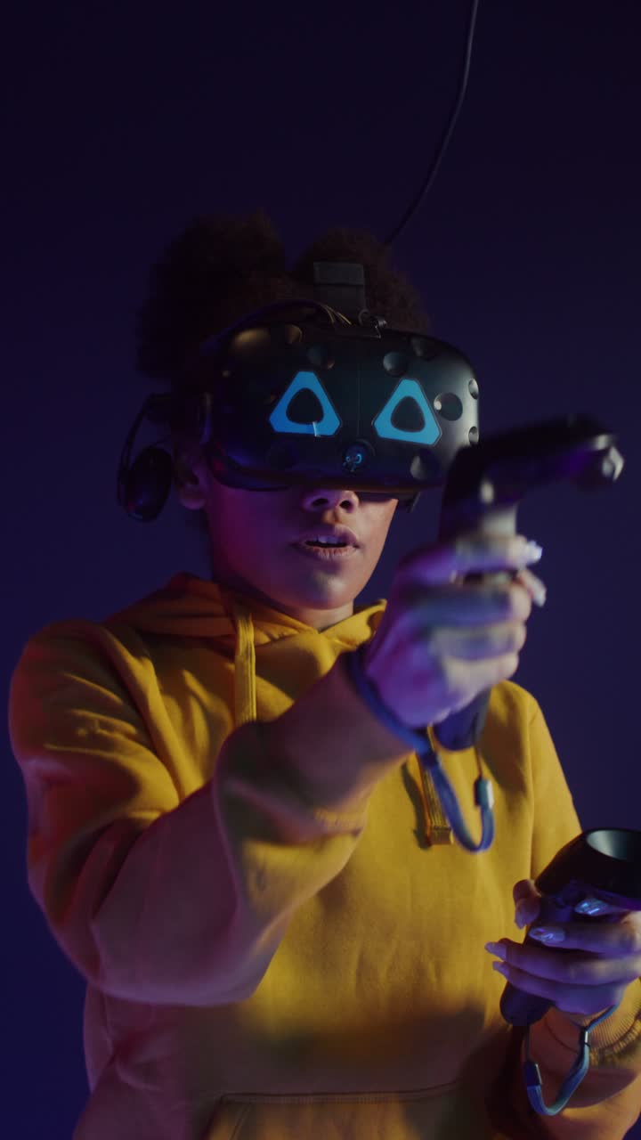 Woman experiencing virtual reality with VR headset and controllers