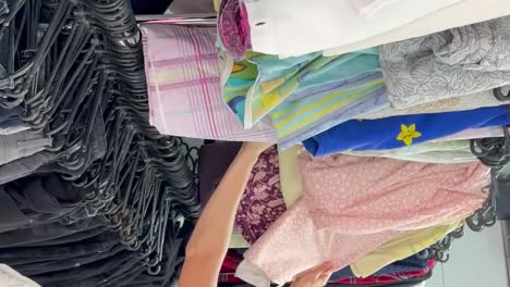 used clothes on hangers in a store a big pile of old useless clothes fashion used clothes on hangers in a store a big pile of old useless clothes fashion second hand
