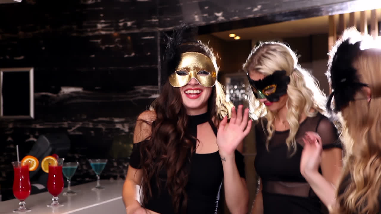 Attractive friends dancing together on the dance floor