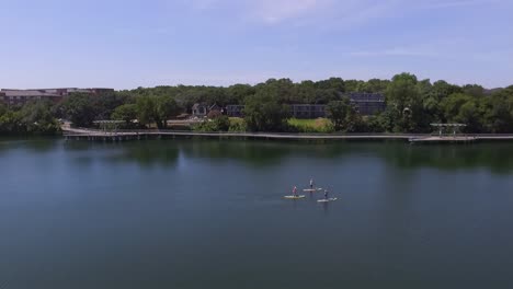 aerial view of paddle boarders on the ladybird lake in austin, tx