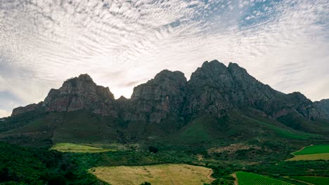 Embark-on-a-visual-journey-through-South-Africa's-majestic-mountains-with-this-stunning-hyperlapse-footage-capturing-the-dynamic-movement-of-clouds-and-the-lush-green-landscapes