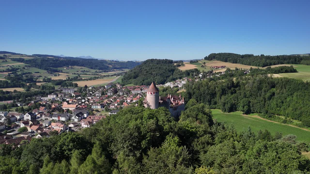 Lucens Switzerland medieval town castle historical heritage site aerial drone