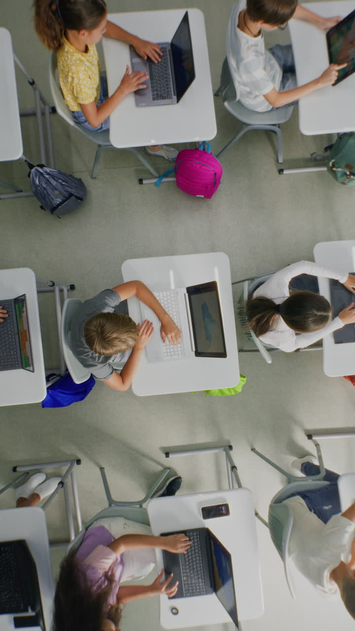 Elementary School Children Using Computers Doing Creative 3D Design Projects