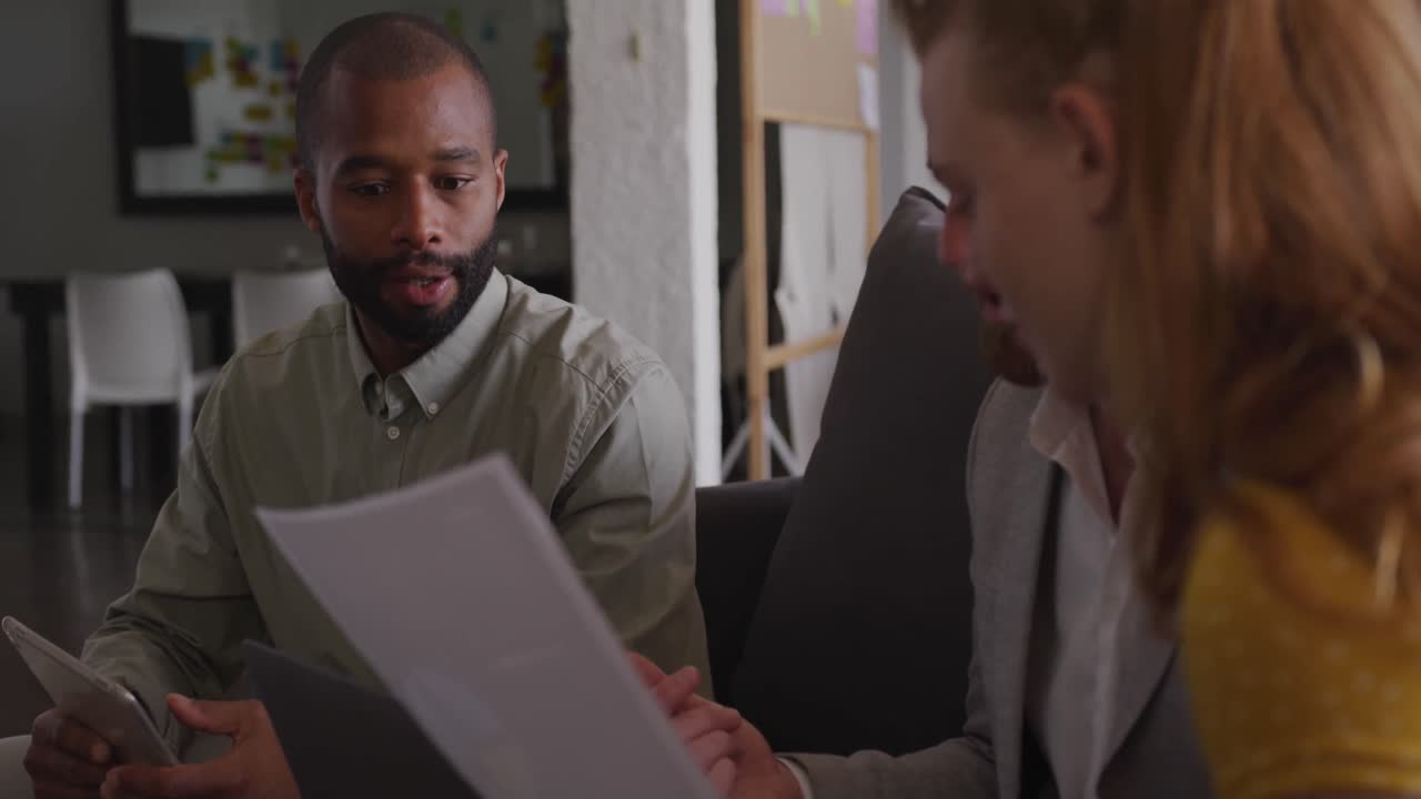 Young creative professionals working in a modern office