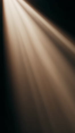 spotlight rays on dark background