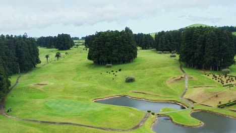 Cinematic-aerial-drone-shot-of-green-golf-course