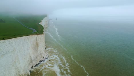 seven systers white cliffs, road, car and people in fog taken by dji mini 3 pro drone in eastbourne england