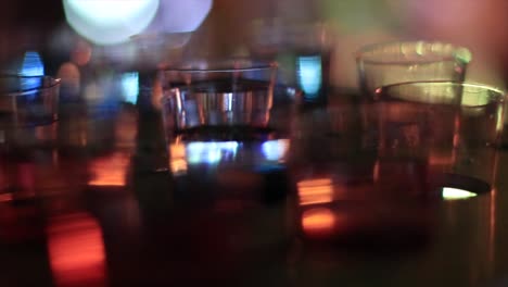 shoots laid out on a table at a bar