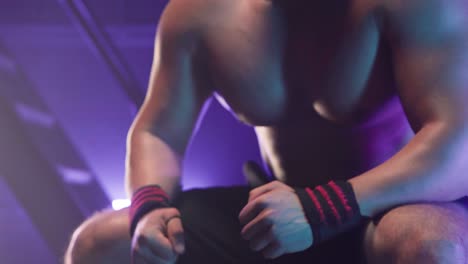 man working out and injured wrist
