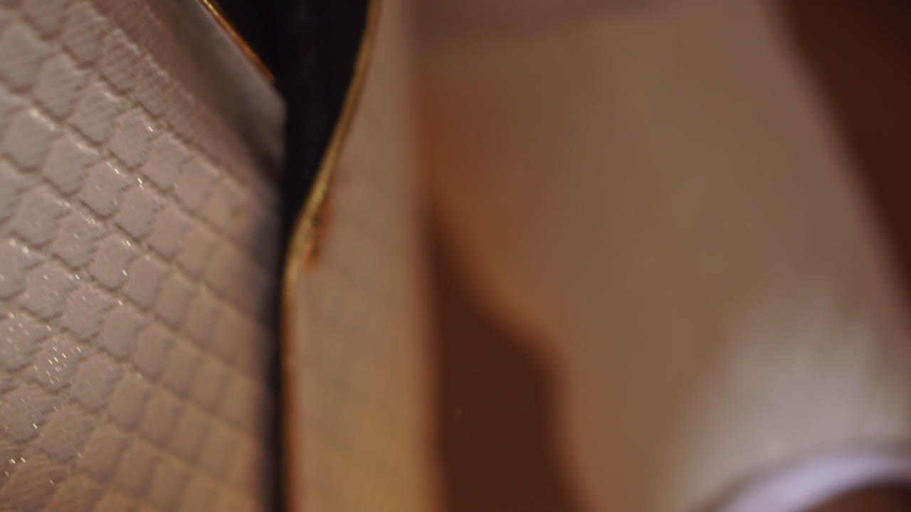 The groom setting in the final touches to his suit before going out for the wedding ceremony.