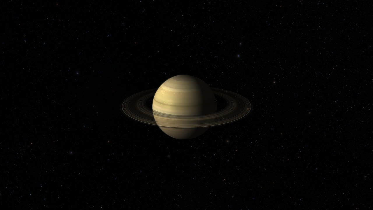 CGI composite: planet Saturn with rings rotating, center-wide shot