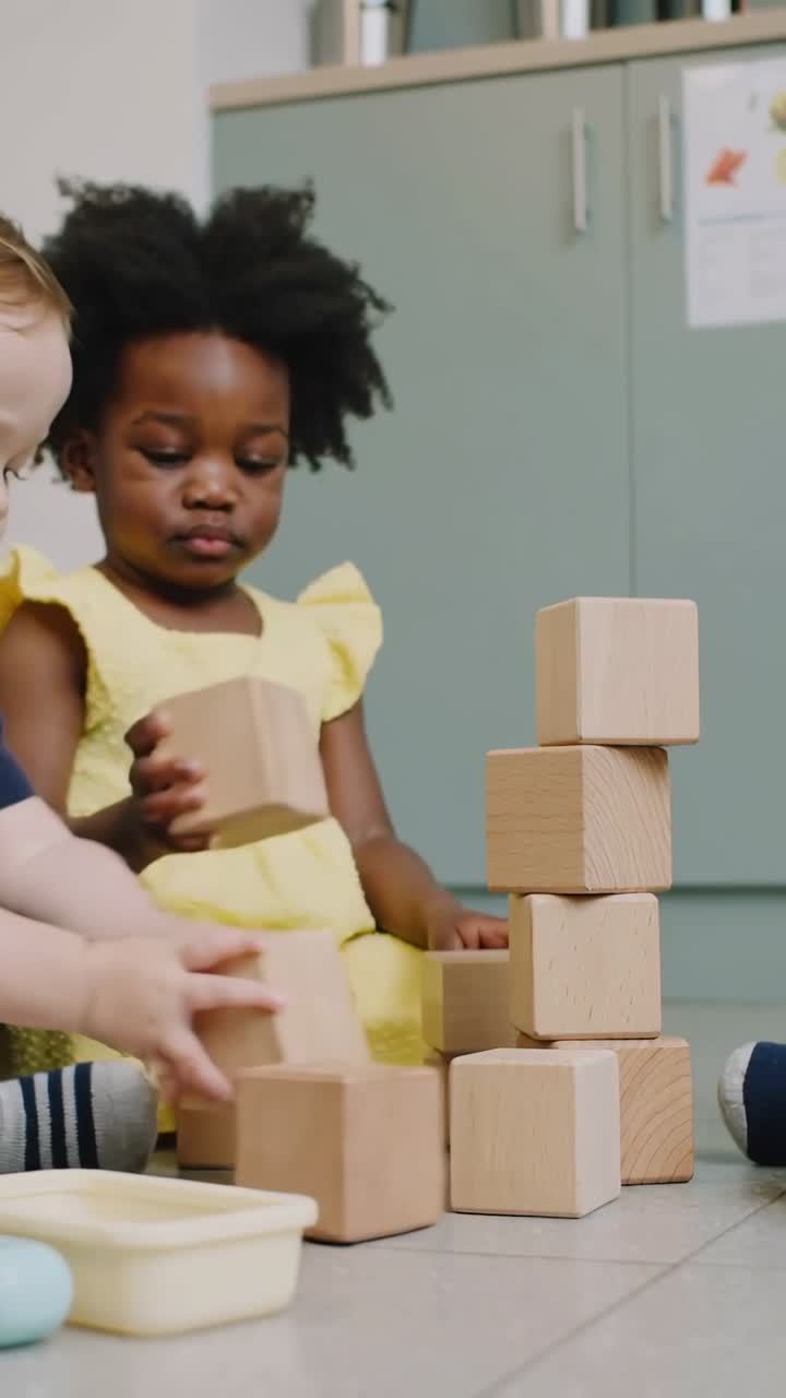 Young Black Girl Playing with Wooden Blocks in a Playroom