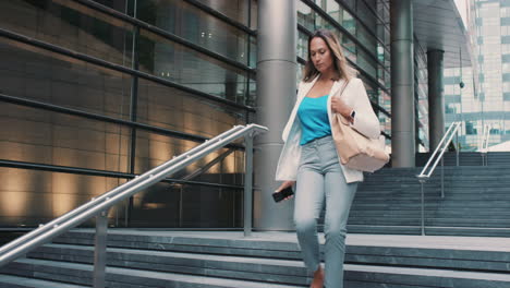 Beautiful-mixed-race-business-woman-walking-through-city