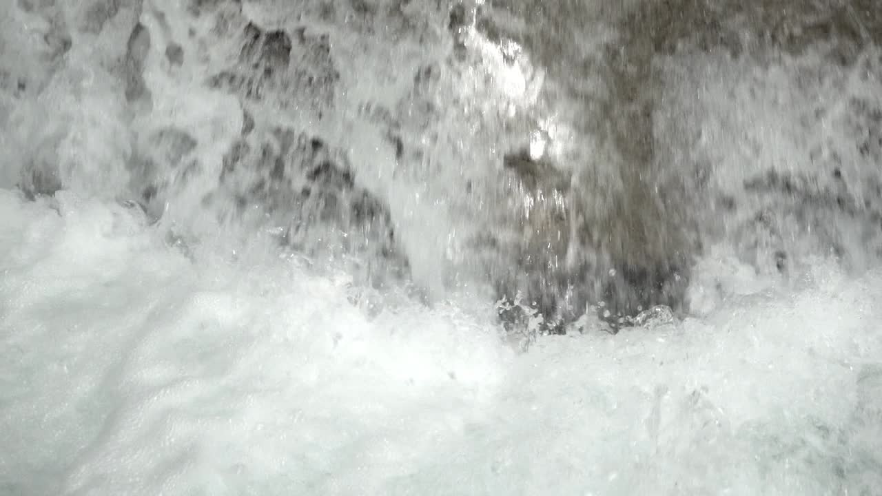 Water falling in dangerous weir, slow-motion 120p slowed to 30p