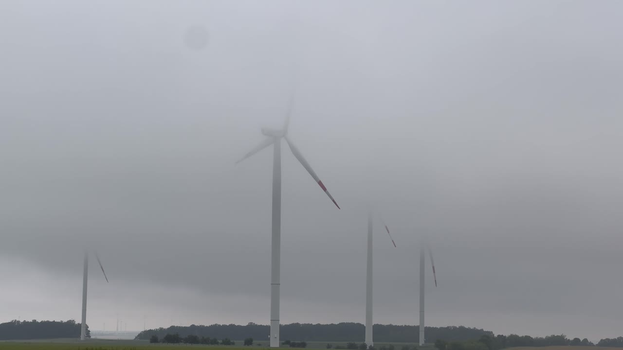 Wind Turbines Shrouded in Fog