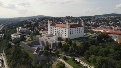 aerial - bratislava castle overlooking the city of bratislava, slovakia