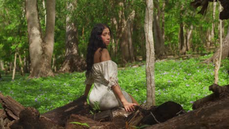 dressed in a pretty outfit, a young latina girl enjoys the charm of a caribbean park on the island of trinidad