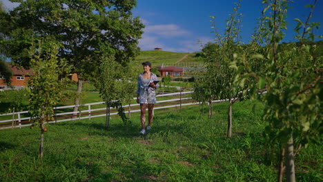 woman working in an orchard