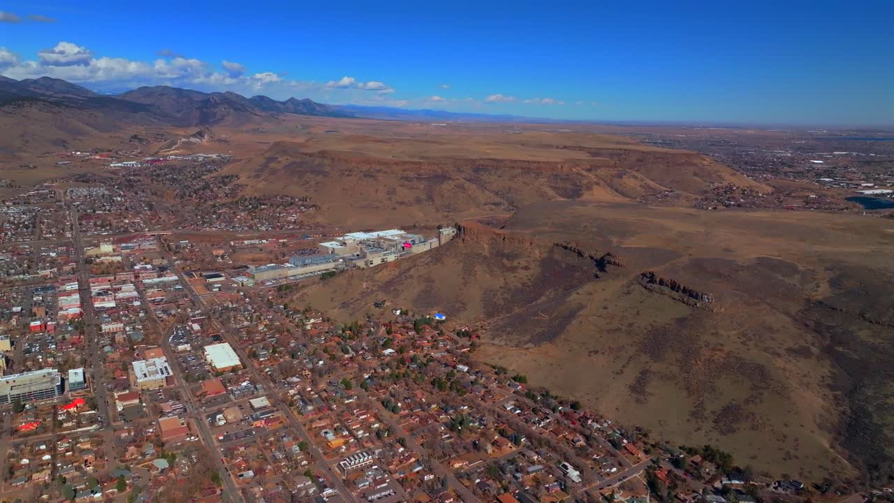 Golden Colorado aerial drone Colorado historic downtown Golden Gate Canyon winter sunny morning afternoon blue sky Boulder Flat Irons Clear Creek Lookout Mountain Coors Beer Factory backwards pan up