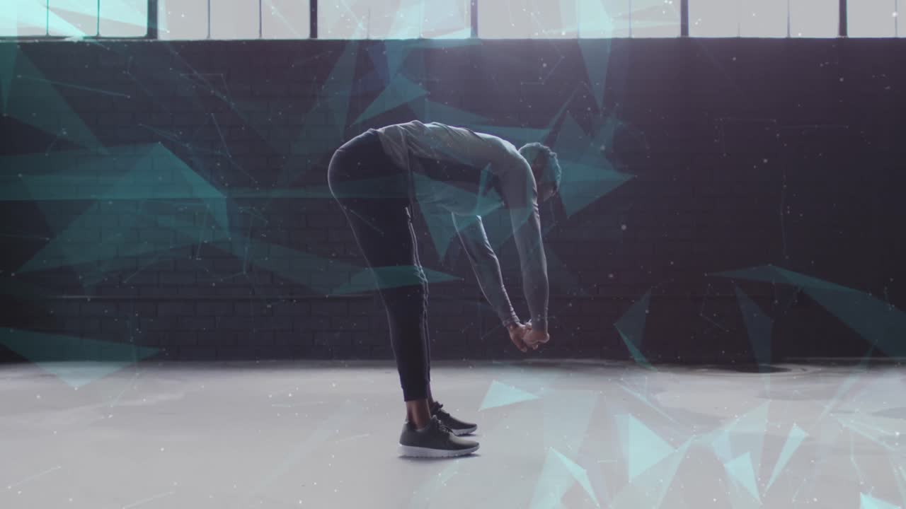 Animation of networks of connections over man stretching, exercising in gym