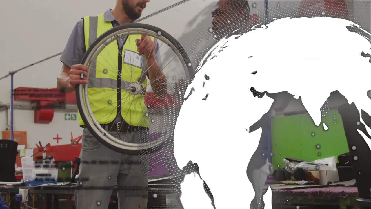 グローブが右にスライドし、ショップでアライメントのために自転車のホイールを検査し、振れ取りを行っている技術者たちが現れます。