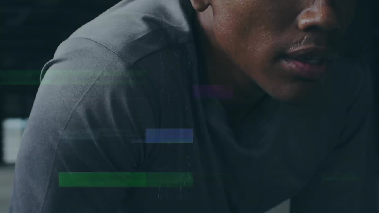 Animation of interference over african american sportsman at gym