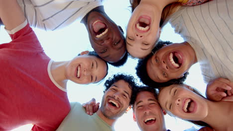 diverse group of friends form a circle outdoors