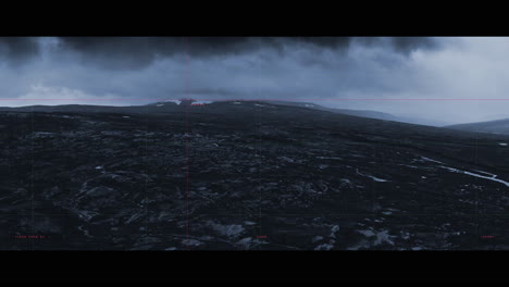mountain landscape under stormy skies