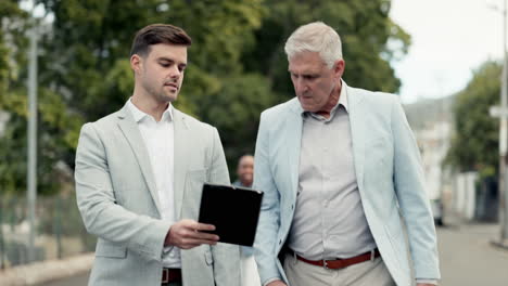 businessman, tablet and talking to boss