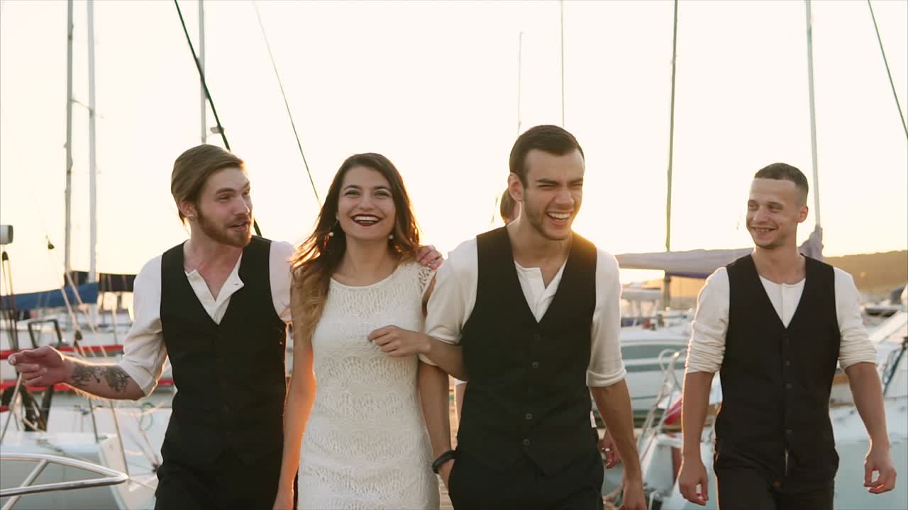 Friends Enjoying Sunset at the Harbor