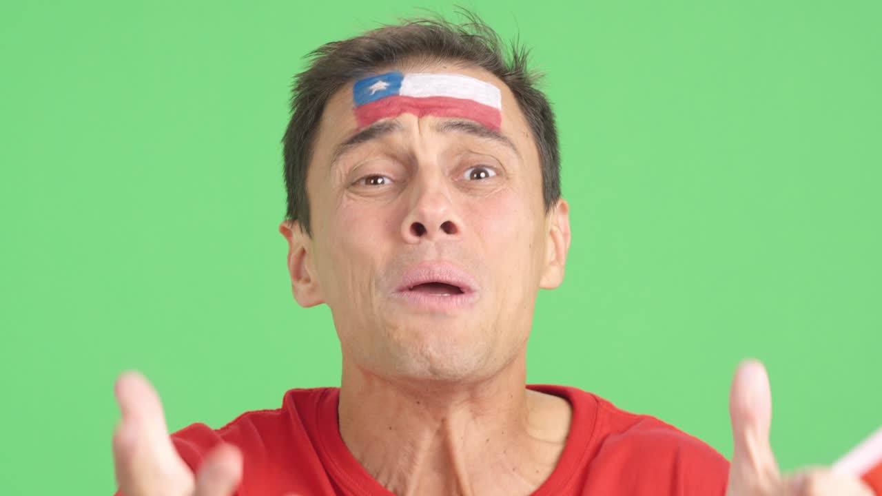 Very nervous man supporting chilean team during a difficult match