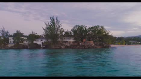 coastal caribbean houses on a rocky