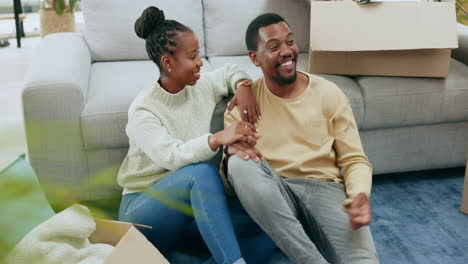 Black-couple-relax-on-floor