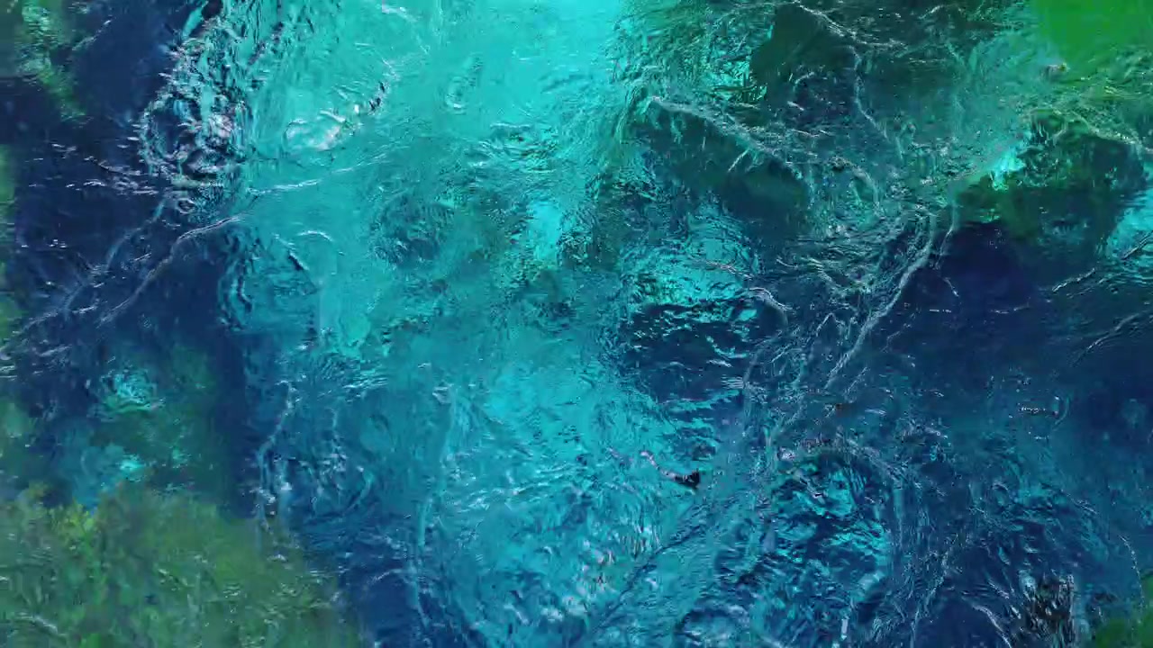 Superficie increspata di acqua turchese limpida