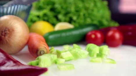 Man-Making-Salad-In-Kitchen-8