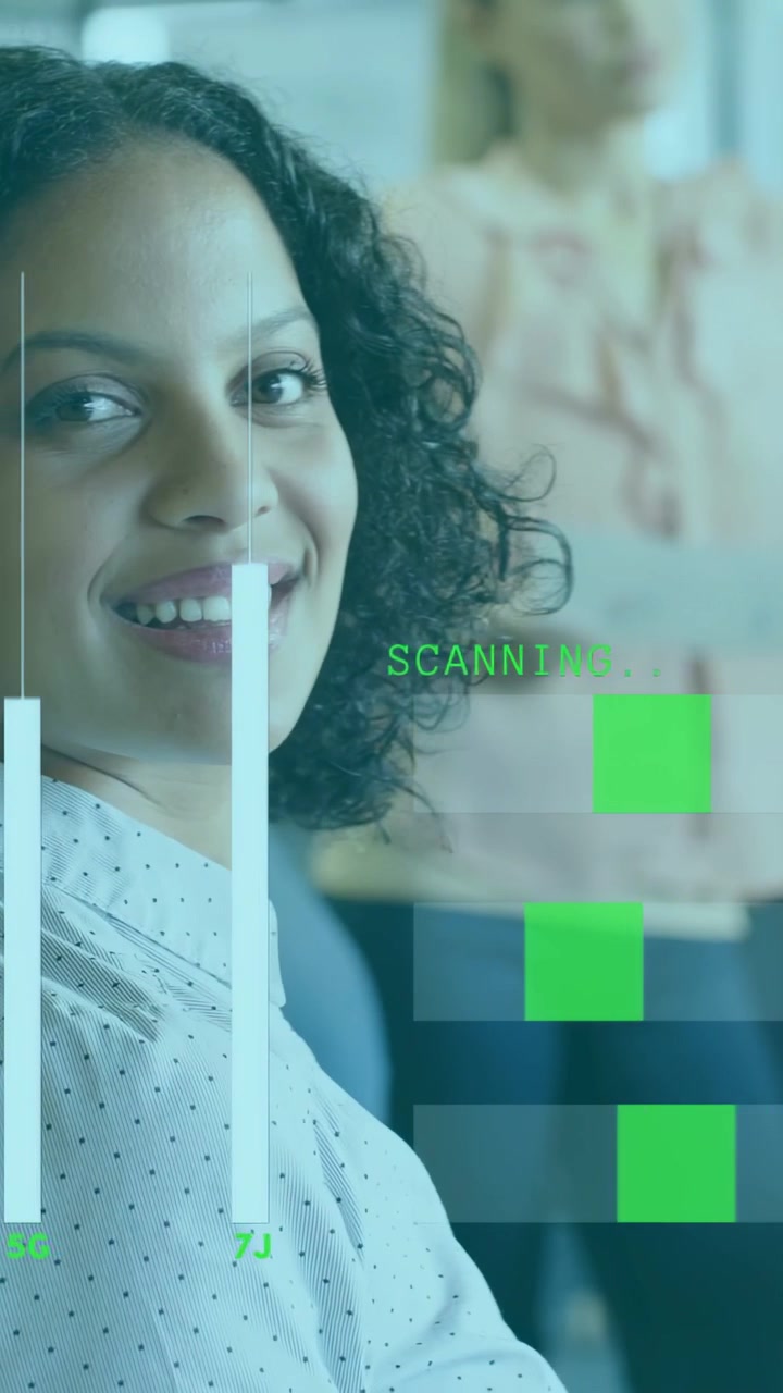 Vertical video: Seated woman turning to cam as SCANNING animating bars, urging smile for tech demo